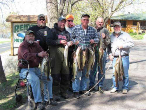 group of happy anglers that stayed at rutting ridge motel